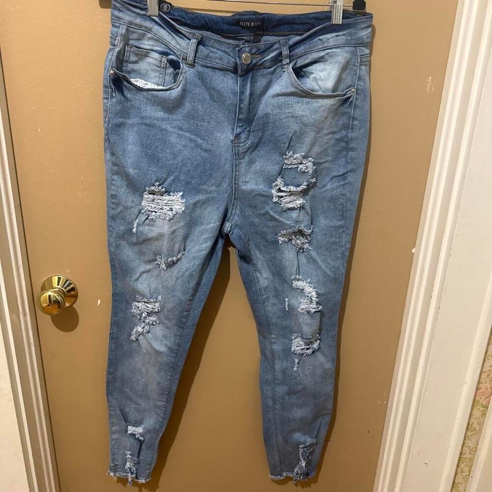 Blue distressed denim jeans